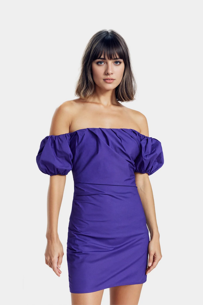 Chic purple dresses with a fitted silhouette and side draping.